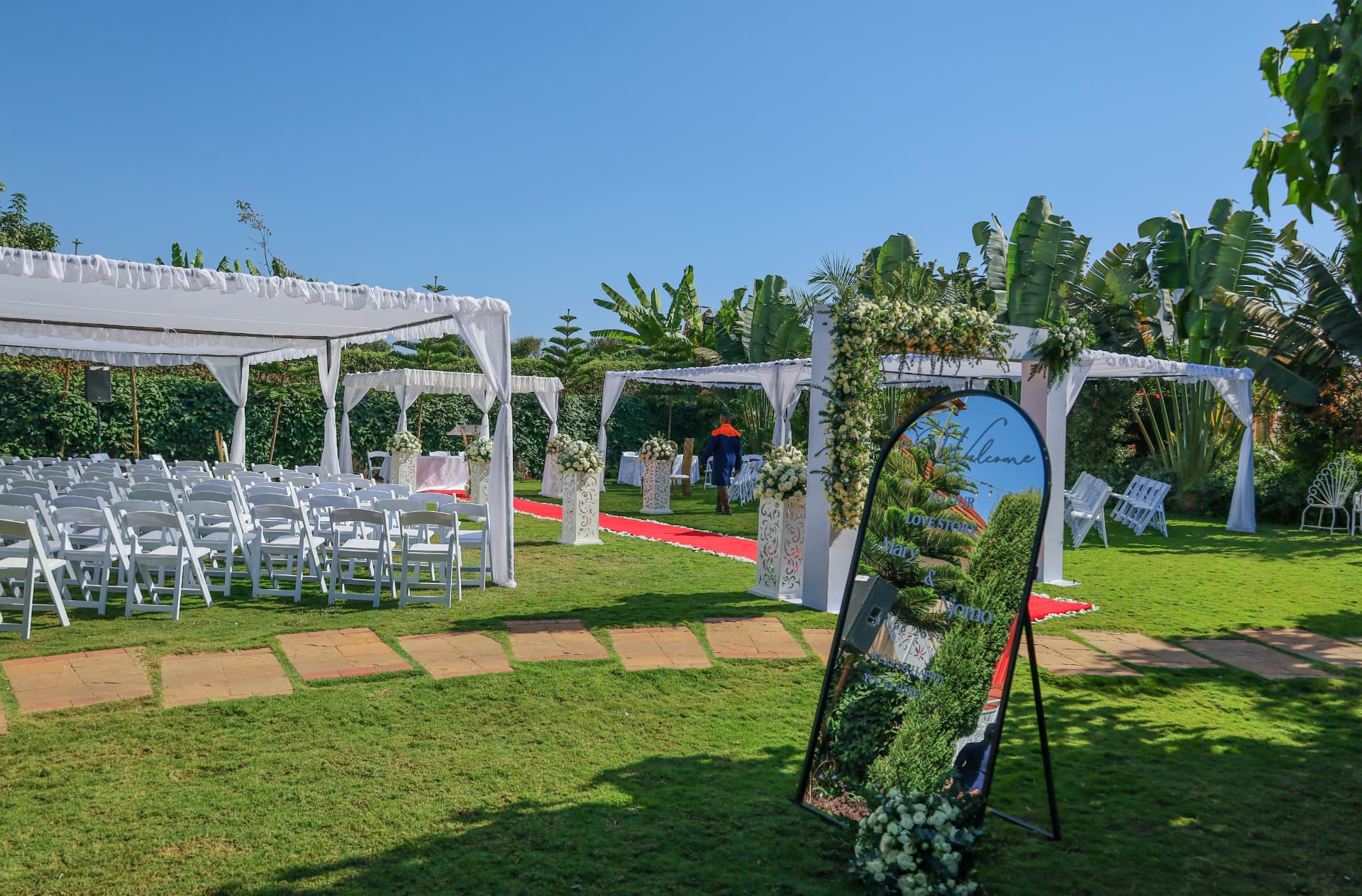 Wide view of Vipe Bliss Gardens arranged for an outdoor celebration